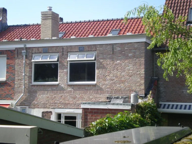 Achtergevel, schoorsteen en dakwerk &ndash; project van BMW Bouw